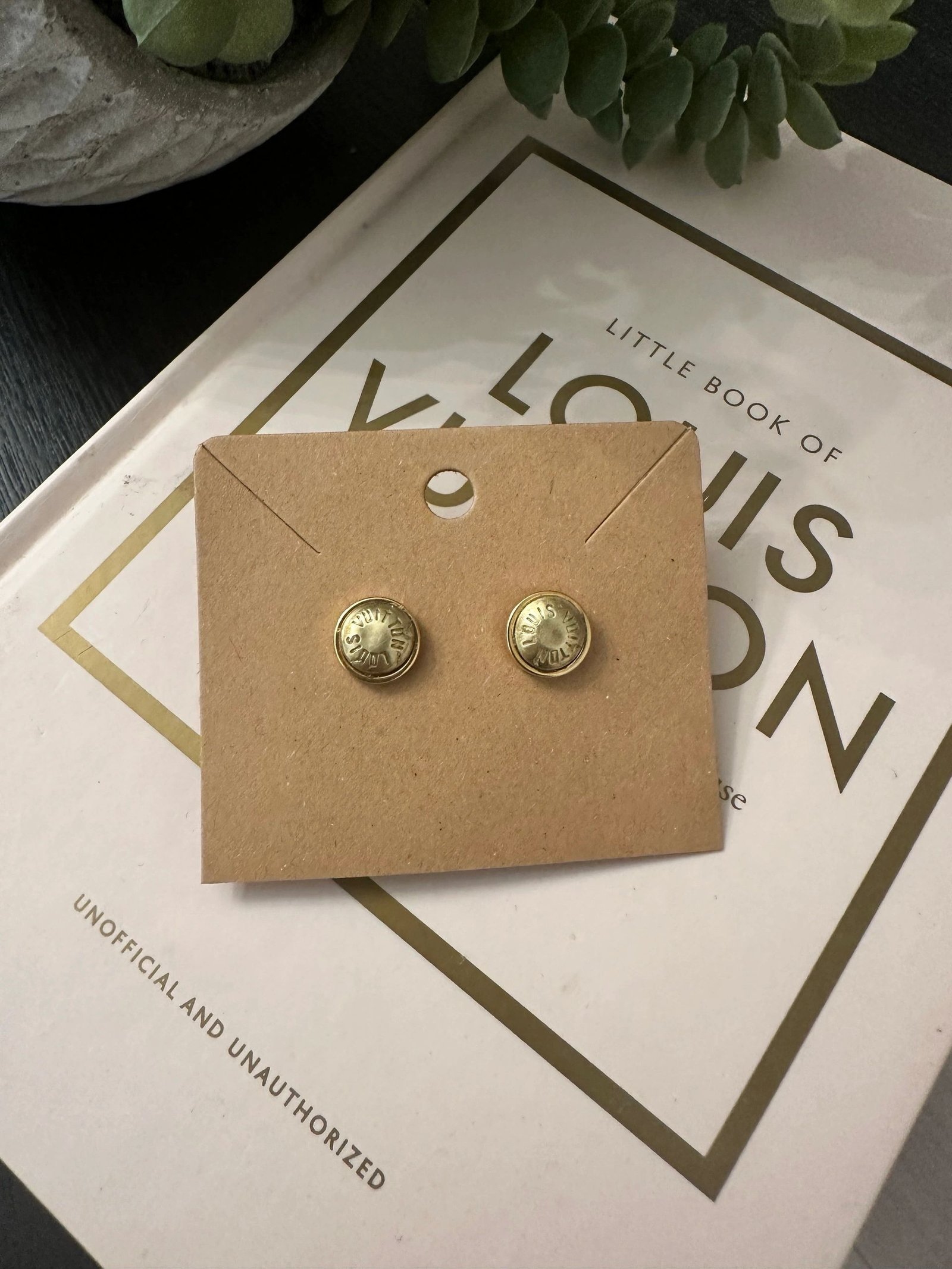 L V Rivet Stud Earrings